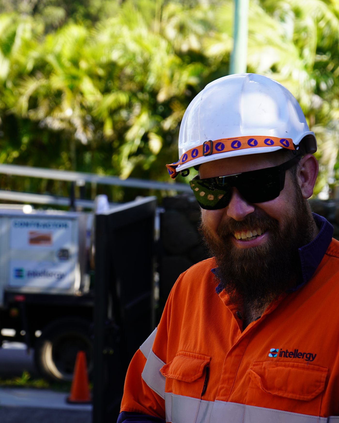 Intellergy crew member working on a street light from an elevated platform